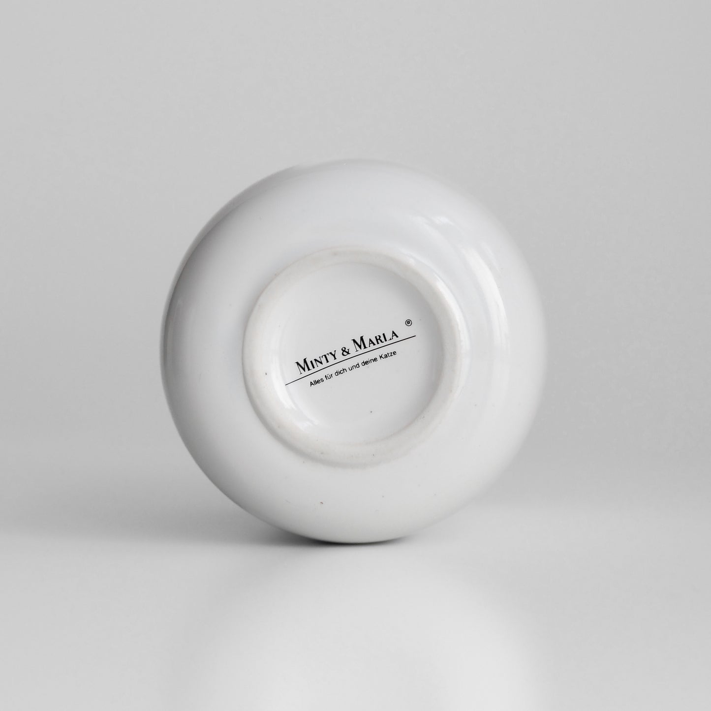 Weiße Keramiktasse mit Aufdruck